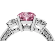 Fancy Pink Cushion Cut Diamond Three-Stone Ring Set in White gold with Round Side Stones and Pavé Band