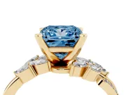 Fancy Blue Princess Cut Diamond Solitaire Ring Set in Yellow gold with Marquise Twist Band and Prong Setting