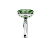 Fancy Green Emerald Cut Diamond Solitaire Ring Set in White gold with Prong Setting on a Polished Plain Band