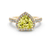 Fancy Yellow Heart Cut Diamond Halo Engagement Ring Set in Yellow gold with Pavé Band and Prong Setting