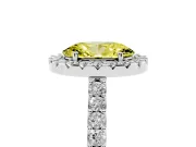 Fancy Yellow Oval Cut Diamond Halo Pavé Solitaire Ring Set in White gold with Prong-Set Center Stone
