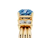 Fancy Blue Three-Stone Cushion Cut Diamond Channel Set Ring Set in Yellow gold with Bar Prongs
