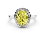 Fancy Yellow Oval Cut Diamond Halo Ring Set in White gold with Solitaire Band and Prong Setting