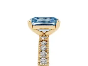 Fancy Blue Emerald Cut Diamond Solitaire Ring Set in Yellow gold with Slim Pavé Band and Prong Setting