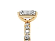 Emerald Cut Diamond Solitaire Set in Yellow gold with Round Pavé Band and Prong Setting
