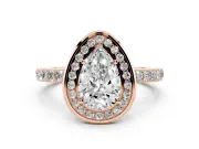 Pear Cut Diamond Halo Ring Set in Rose gold with Bezel Frame and Pavé Band