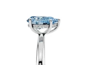 Fancy Blue Pear Cut Diamond Solitaire Ring Set in Platinum with Thin Band and Prong Setting