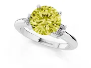 Fancy Yellow Three-Stone Round Cut Diamond Ring Set in Platinum with Prong Setting and Plain Band