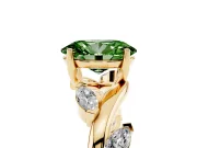 Fancy Green Oval Cut Diamond Solitaire Ring Set in Yellow gold with Twisted Marquise Accent Band