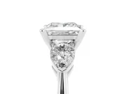 Three-Stone Princess Cut Diamond Ring Set in White gold with Pear Side Stones and Prong Setting