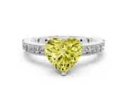Fancy Yellow Heart Cut Diamond Solitaire Ring Set in Platinum with Slim Pavé Band and Prong Setting