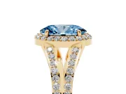 Fancy Blue Oval Cut Diamond Halo Split Shank Pavé Ring Set in Yellow gold with Prong Setting