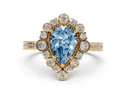 Fancy Blue Pear Cut Diamond Halo Milgrain Pavé Ring Set in Yellow gold with Prong Setting
