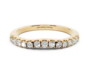 Round Diamond Curved Eternity Band Set in Yellow gold with Pavé Shared Prongs