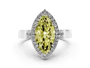 Fancy Yellow Marquise Cut Diamond Halo Ring Set in White gold with Pavé-Lined Split Shank Band