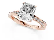 Radiant Cut Diamond Engagement Ring Set in Rose gold with Side Stone Accents and Prong Setting