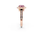 Fancy Pink Round Cut Diamond Halo Solitaire Ring Set in Rose gold with Pavé Band and Bezel Setting