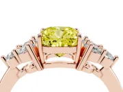 Fancy Yellow Cushion Cut Diamond Solitaire Ring Set in Rose gold with Cluster Accents on Each Side