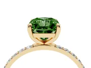 Fancy Green Radiant Cut Diamond Solitaire Ring Set in Yellow gold with Round Pavé Band and Prong Setting
