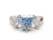 Heart-Shaped Three Stone Engagement Ring Setting for a Fancy Blue Lab-Grown Diamond | Wide Tapered Shoulders | Rose Gold