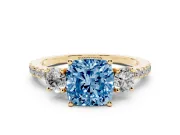 Cushion Cut Three Stone Engagement Ring Setting for a Fancy Blue Lab-Grown Diamond | Pave Shoulders | Yellow Gold