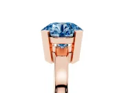 Fancy Blue Round Cut Diamond Solitaire Ring Set in Rose gold with Prong Head and Smooth Polished Band