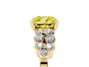 Fancy Yellow Cushion Cut Diamond Cluster Engagement Ring Set in Yellow gold with Pavé Band and Prong Setting