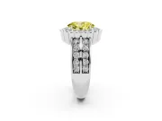 Fancy Yellow Oval Cut Diamond Scalloped Halo Ring Set in White gold with Pavé Split Shank