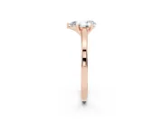 Pear Cut Diamond Solitaire Ring Set in Rose gold with Prong Setting and Classic Band