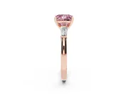 Fancy Pink Princess Cut Diamond Solitaire Ring Set in Rose gold with Tapered Baguette Side Stones and Prong Setting