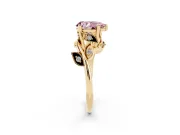 Fancy Pink Pear Cut Diamond Solitaire Twist Engagement Ring Set in Yellow gold with Pavé Leaf Accents