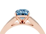 Fancy Blue Emerald Cut Diamond Solitaire Ring Set in Rose gold with Channel-Set Band and Prong Setting