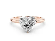 Heart Cut Diamond Solitaire Engagement Ring Set in Rose gold with Prong Setting and Polished Band