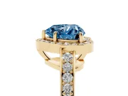 Fancy Blue Heart Cut Diamond Halo Pavé Engagement Ring Set in Yellow gold with Bezel Setting