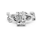 Emerald Cut Diamond Solitaire Ring Set in Platinum with Twisted Marquise Accent Band