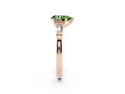 Fancy Green Pear Cut Diamond Solitaire Ring Set in Rose gold with Tapered Baguette Accents and Prong Setting