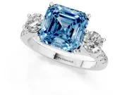 Fancy Blue Three-Stone Asscher Cut Diamond Pavé Band Ring Set in Platinum with Prong-Set Trio