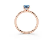 Fancy Blue Emerald Cut Diamond Solitaire Ring Set in Rose gold with Thin Band and Prong Setting