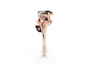 Fancy Black Pear Cut Diamond Solitaire Twist Engagement Ring Set in Rose gold with Pavé Leaf Accents