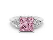Fancy Pink Three-Stone Princess Cut Diamond Ring Set in Silver with Pear Side Stones and Prong Setting