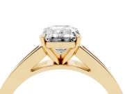 Emerald Cut Diamond Solitaire Ring Set in Yellow gold with Channel-Set Band and Prong Setting