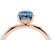 Fancy Blue Emerald Cut Diamond Solitaire Ring Set in Rose gold with Thin Band and Prong Setting