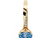 Fancy Blue Radiant Cut Diamond Engagement Ring Set in Yellow gold with Side Stone Accents and Prong Setting