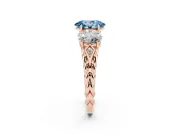 Fancy Blue Oval Cut Diamond Three-Stone Ring Set in Rose gold with Braided Band