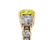Fancy Yellow Cushion Cut Diamond Three-Stone Ring Set in Yellow gold with Pavé Band