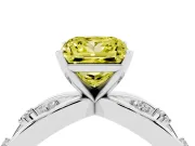 Fancy Yellow Princess Cut Diamond Solitaire Ring Set in White gold with Side Stones on Criss-Cross Band and Prong Setting