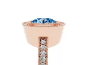 Fancy Blue Round Cut Diamond Halo Engagement Ring Set in Rose gold with Pavé Band and Round Halo Stones