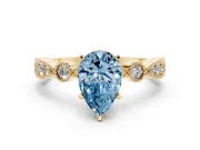 Fancy Blue Pear Cut Diamond Solitaire Engagement Ring Set in Yellow gold with Milgrain Bezel Accent Band