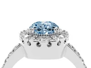 Fancy Blue Oval Cut Diamond Halo Ring Set in Platinum with Pavé Shank and Prong Setting