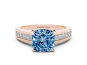 Fancy Blue Cushion Cut Diamond Solitaire Ring Set in Rose gold with Channel-Set Band and Prong Setting